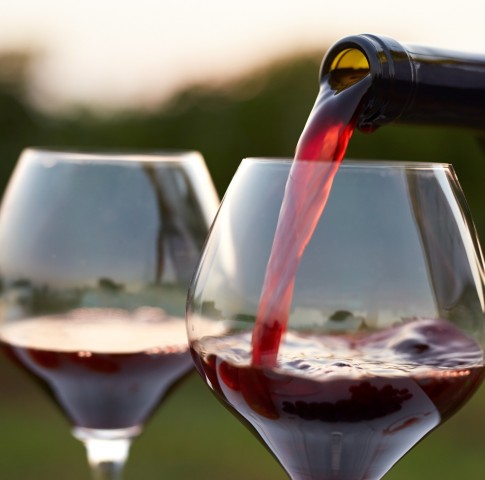 Pouring red wine