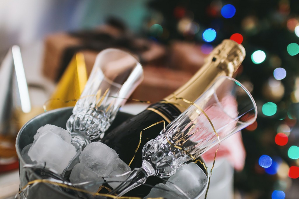 A bottle of champagne in an ice bucket