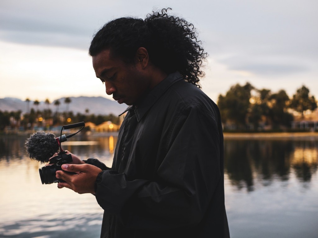 African American man holding a camera