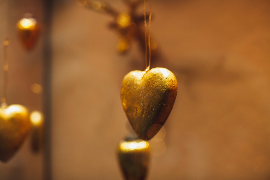 golden heart against a blurred background