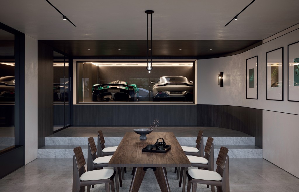 the garage of the residence doubles as a showroom